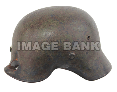 W2Gh172d- Camouflage painted helmet struck by projectiles twice